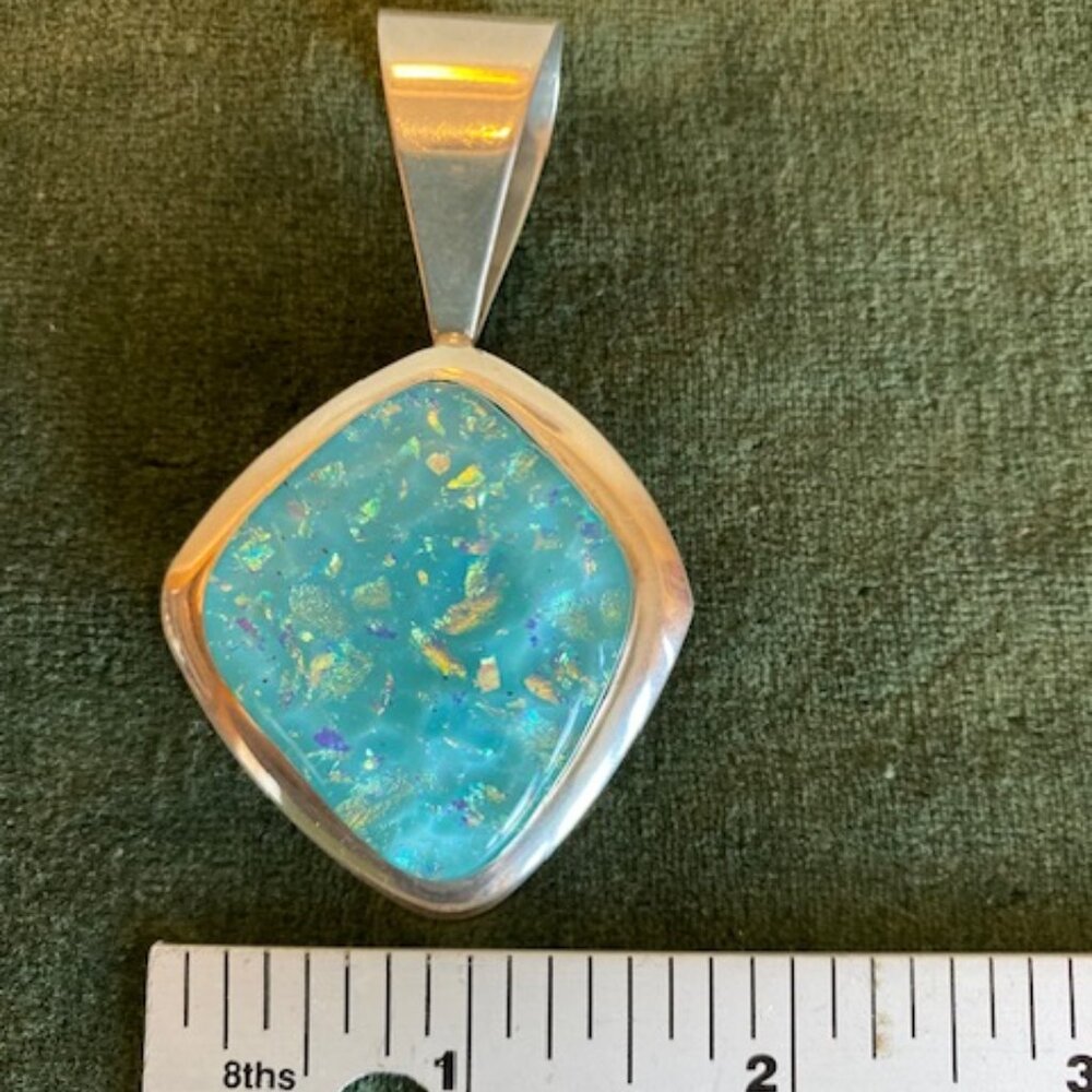 Sterling silver and crushed sleeping beauty turquoise charm